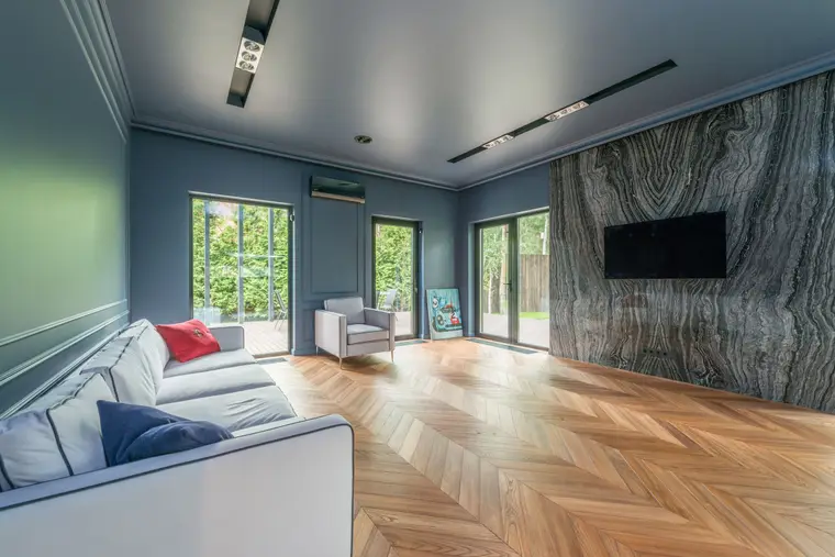 Chevron luxury vinyl plank flooring in a living room